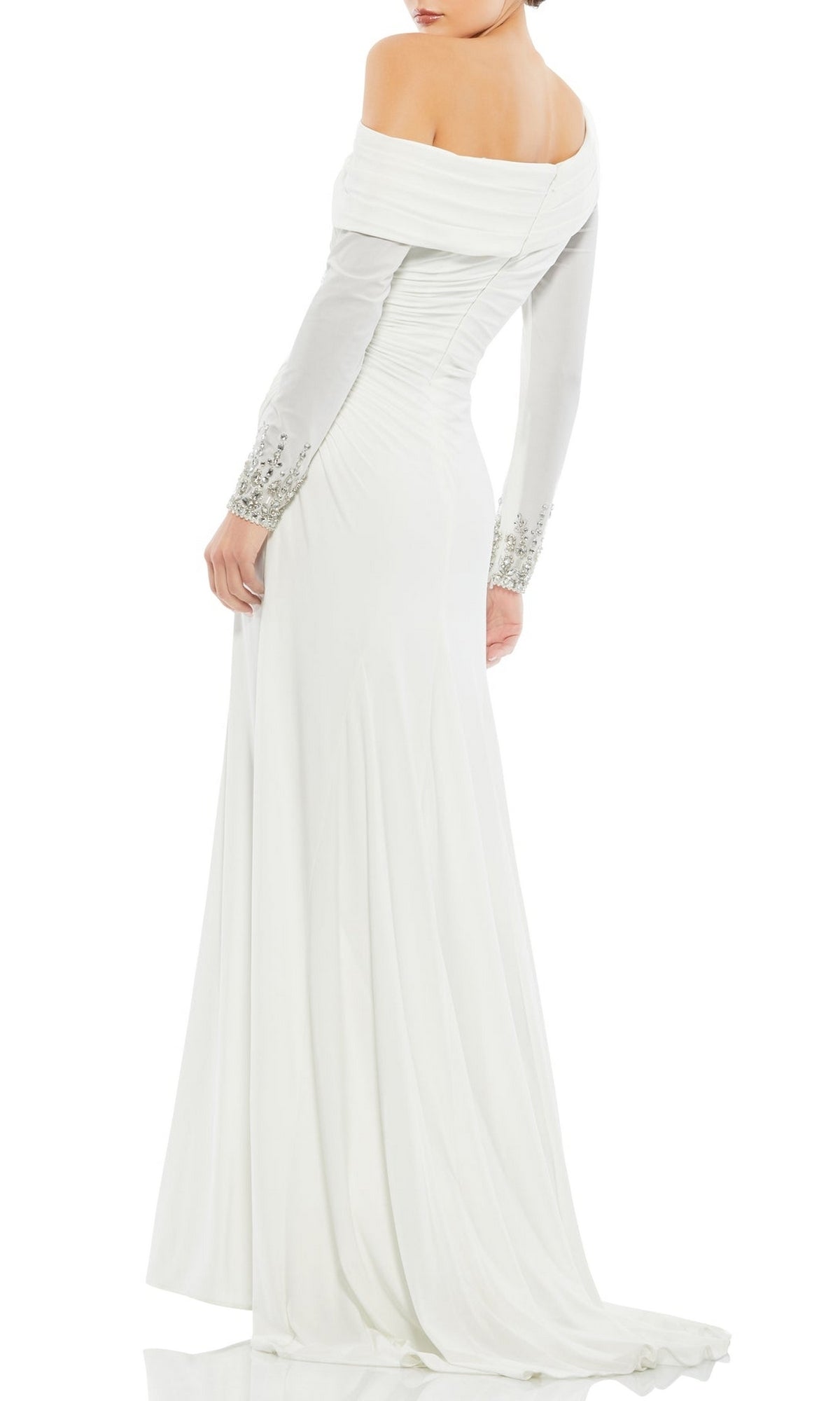 A woman stands gracefully, looking over her shoulder, wearing the Mac Duggal 12231 one-shoulder long formal dress.
